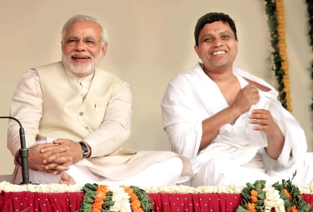 Prime Minister Narendra Modi with Acharya Balkrishna (The Yellow Coin Communication)
